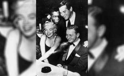 Sammy Davis Jr, Milton Greene, Marilyn Monroe, and Jacques Cernes at Mel Torme’s show at the LA Cresendo Club. 