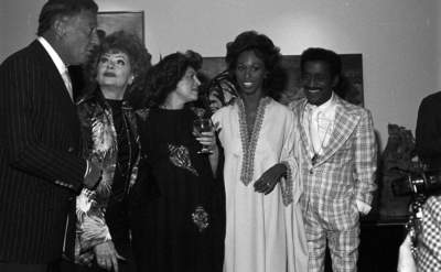 Gary Morton, Lucille Ball, Altovise Davis, and Sammy Davis Jr. at a party together