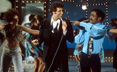 Tom Jones and Sammy Davis Jr. performing 