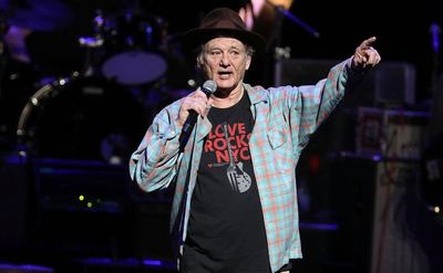 Bill Murray performs on stage.