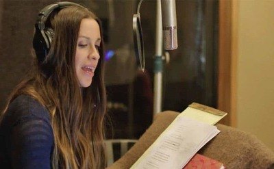 Alanis Morissette is in the recording studio. 