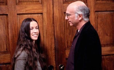 Alanis Morissette and Larry David in still from Curb Your Enthusiasm. 
